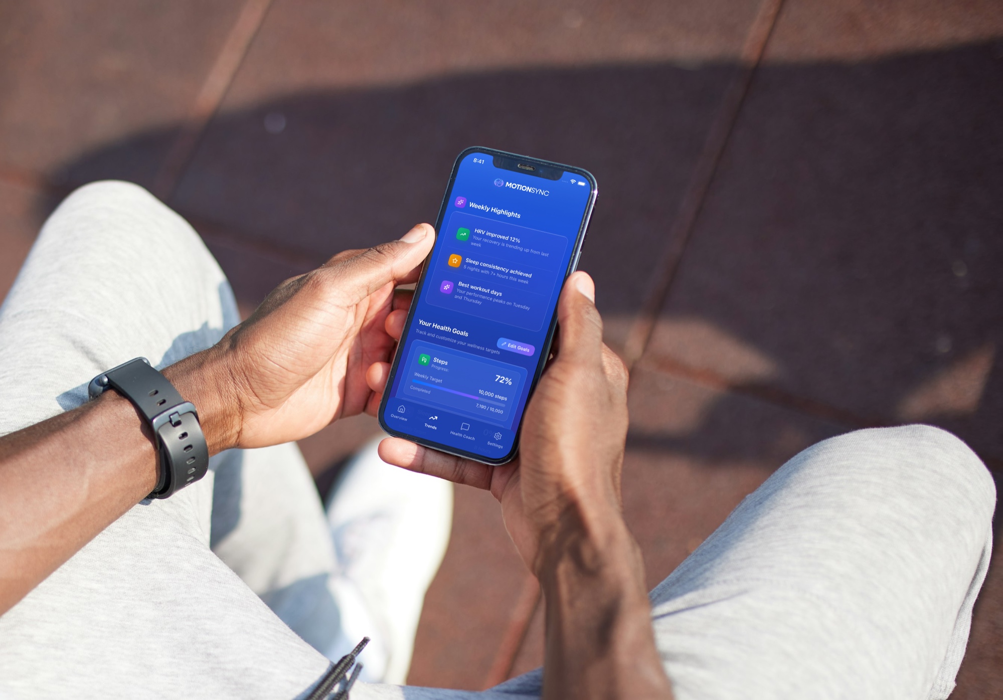MotionSync app showing weekly health highlights summary